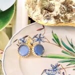 licht blauw oorbel verguld