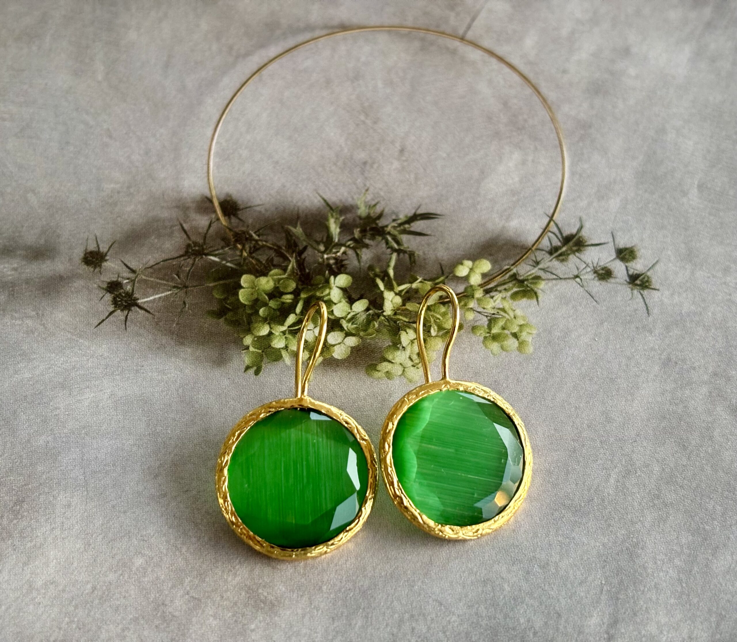 groene Cateye oorbel verguld